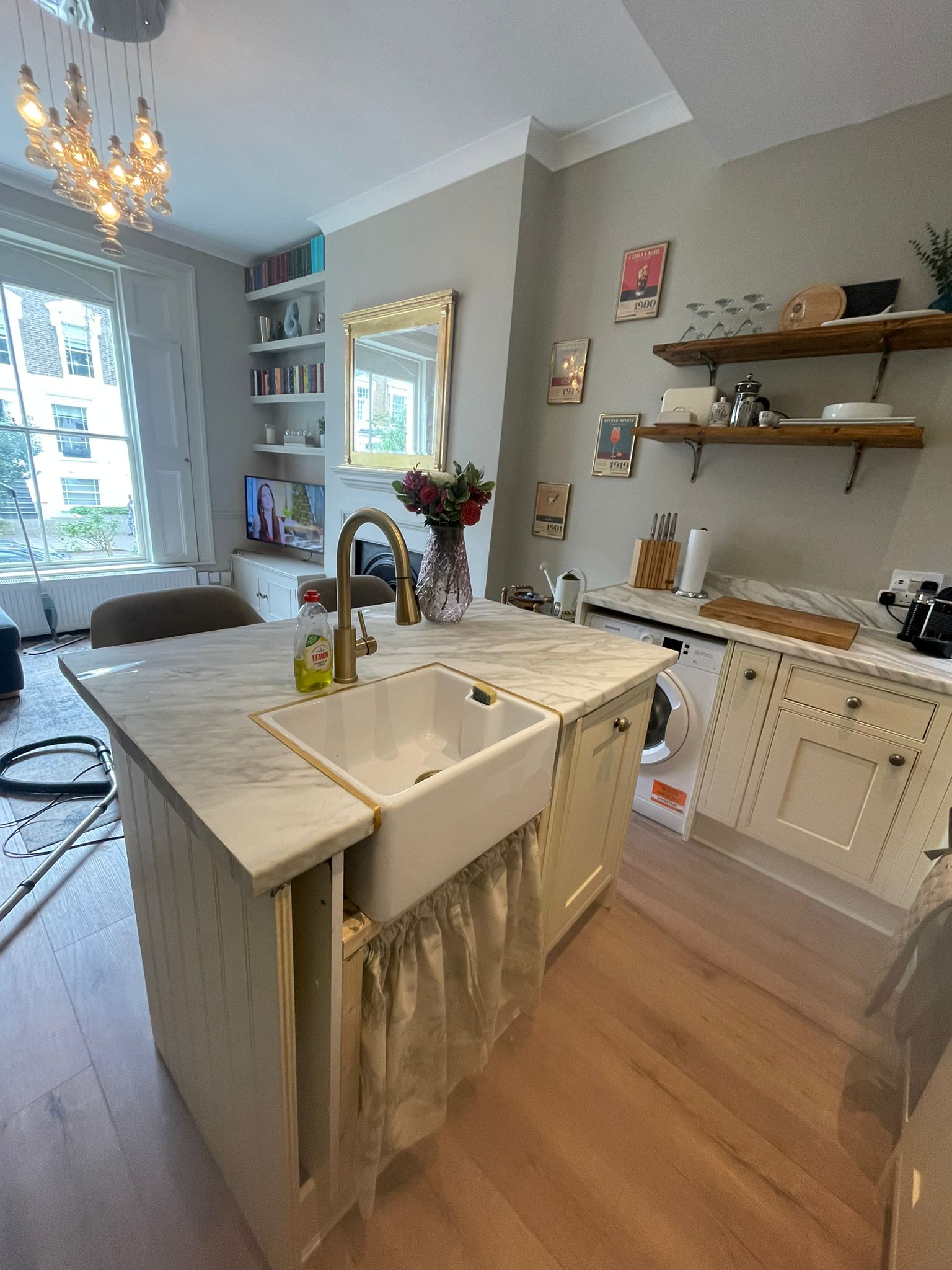 Kitchen island with sink and shelves