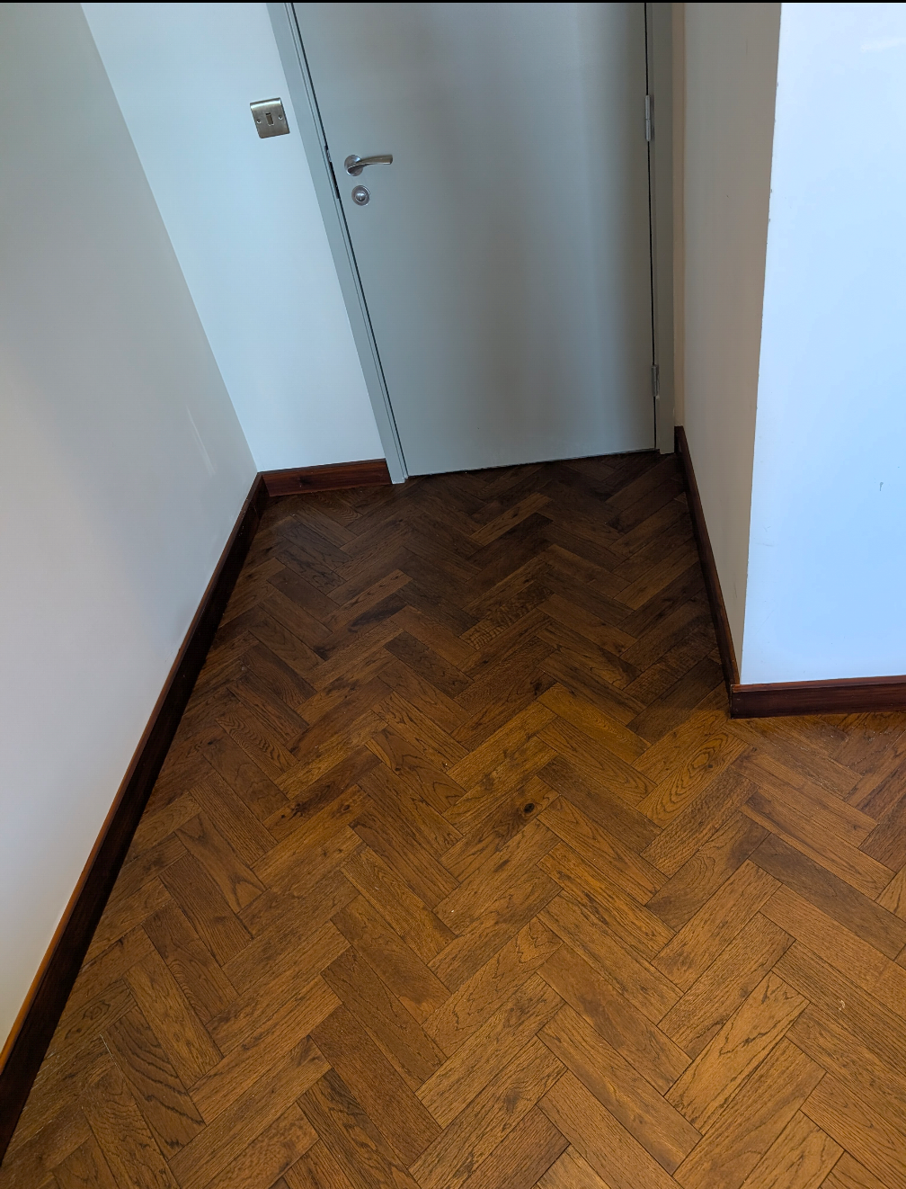 Wooden parquet floor with dark border